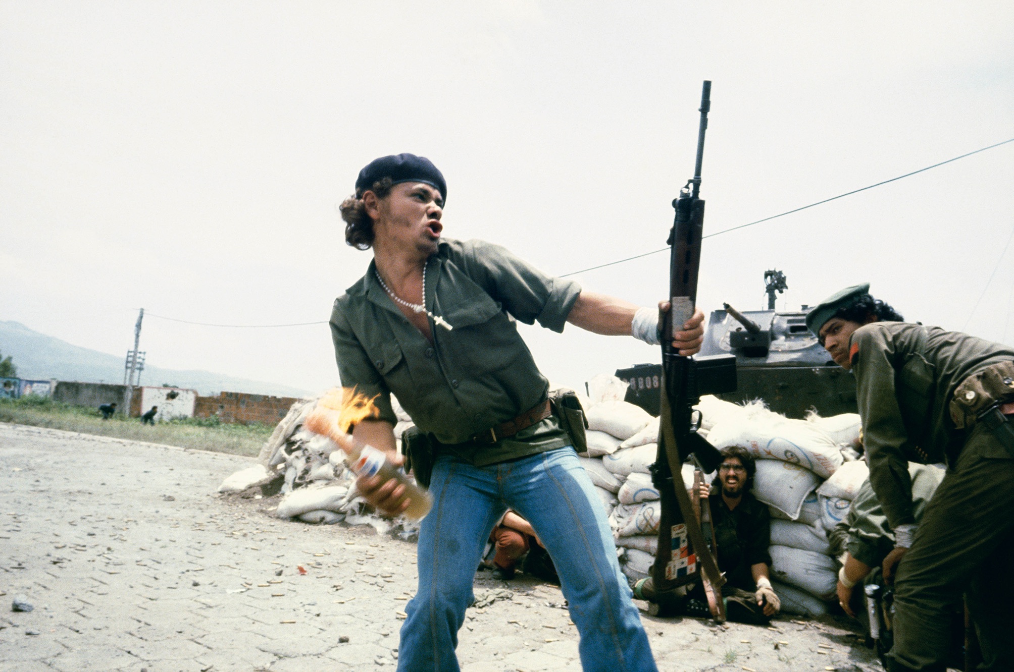 Susan Meiselas, Sandinistas at the gates to the district of National Guard in Esteli, "Man with Molotov Cocktail", Nicaragua, 16 July 1979 Â© Susan Meiselas_ Magnum Photos 