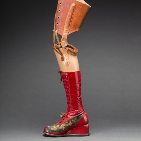 Prosthetic leg with leather boot. Appliquéd silk with embroidered Chinese motifs. From Frida Kahlo: Making Her Self Up, 16 June-14 November. Sponsored by Grosvenor Brit-ain & Ireland. Photograph Javier Hinojosa. Museo Frida Kahlo. © Diego Riviera and Fri-da Kahlo Archives.jpg