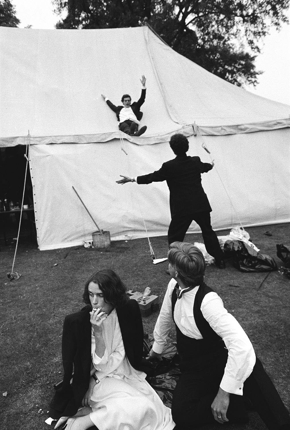 Sliding down the marquee during the New College May Ball. Oxford. 24 June 1983 Â© Dafydd Jones, from the book The Last Hurrah published by STANLEY/BARKER