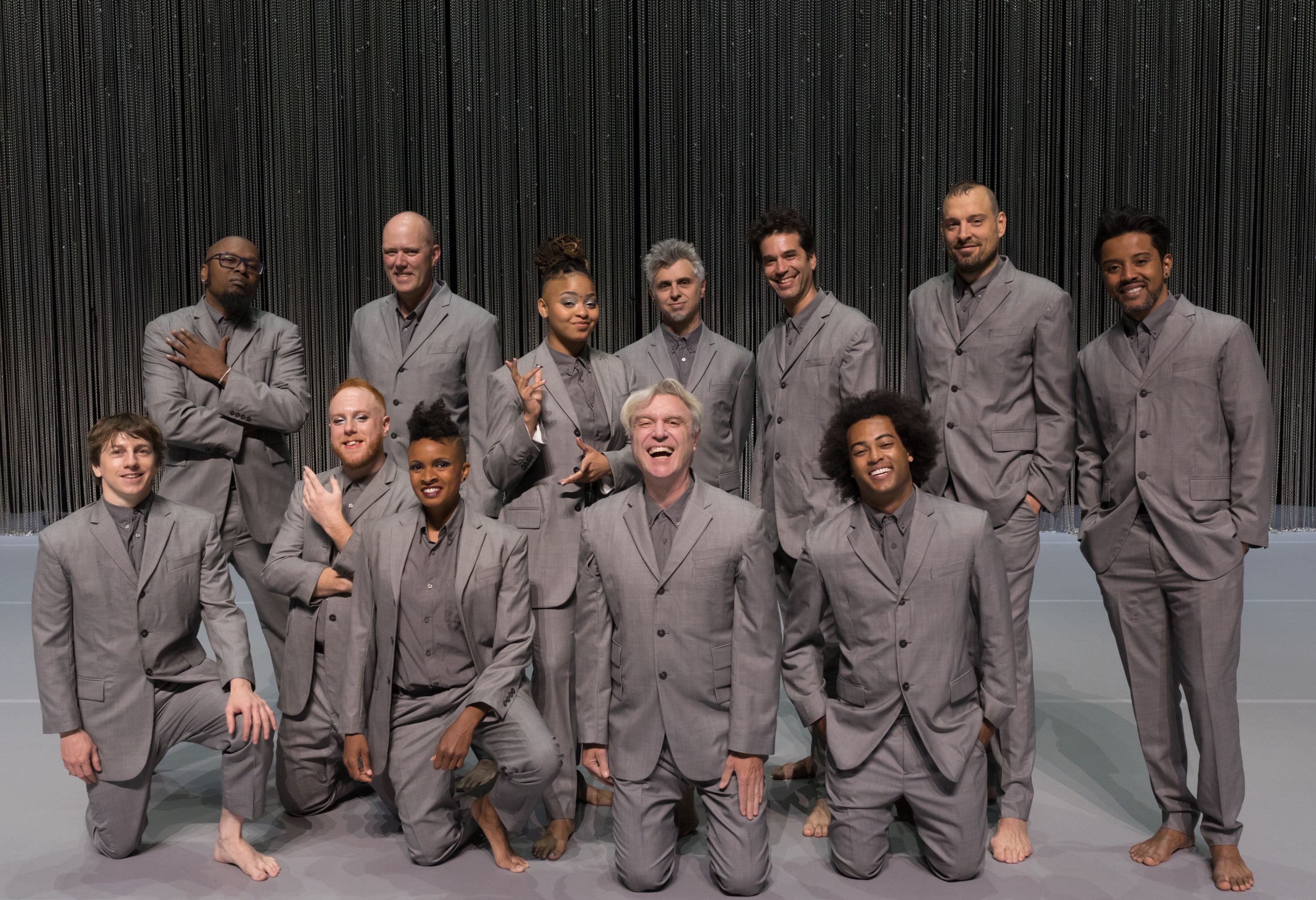 American Utopia Tour: Davi Viera, Karl Mansfield, Tendayi Kuumba, Mauro Refosco, Daniel Freedman, Aaron Johnston, Gustavo Di Dalva, Tim Keiper, Chris Giarmo, Angie Swan, David Byrne, Bobby Wooten. Photography by Donna Lewis.