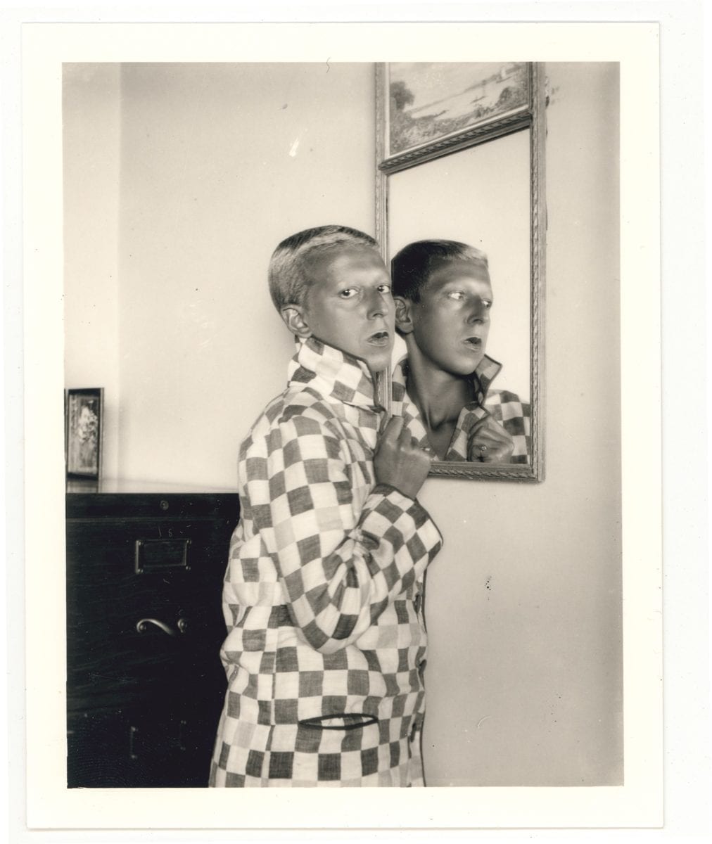 self portrait (reflected in mirror, chequered jacket) 1928