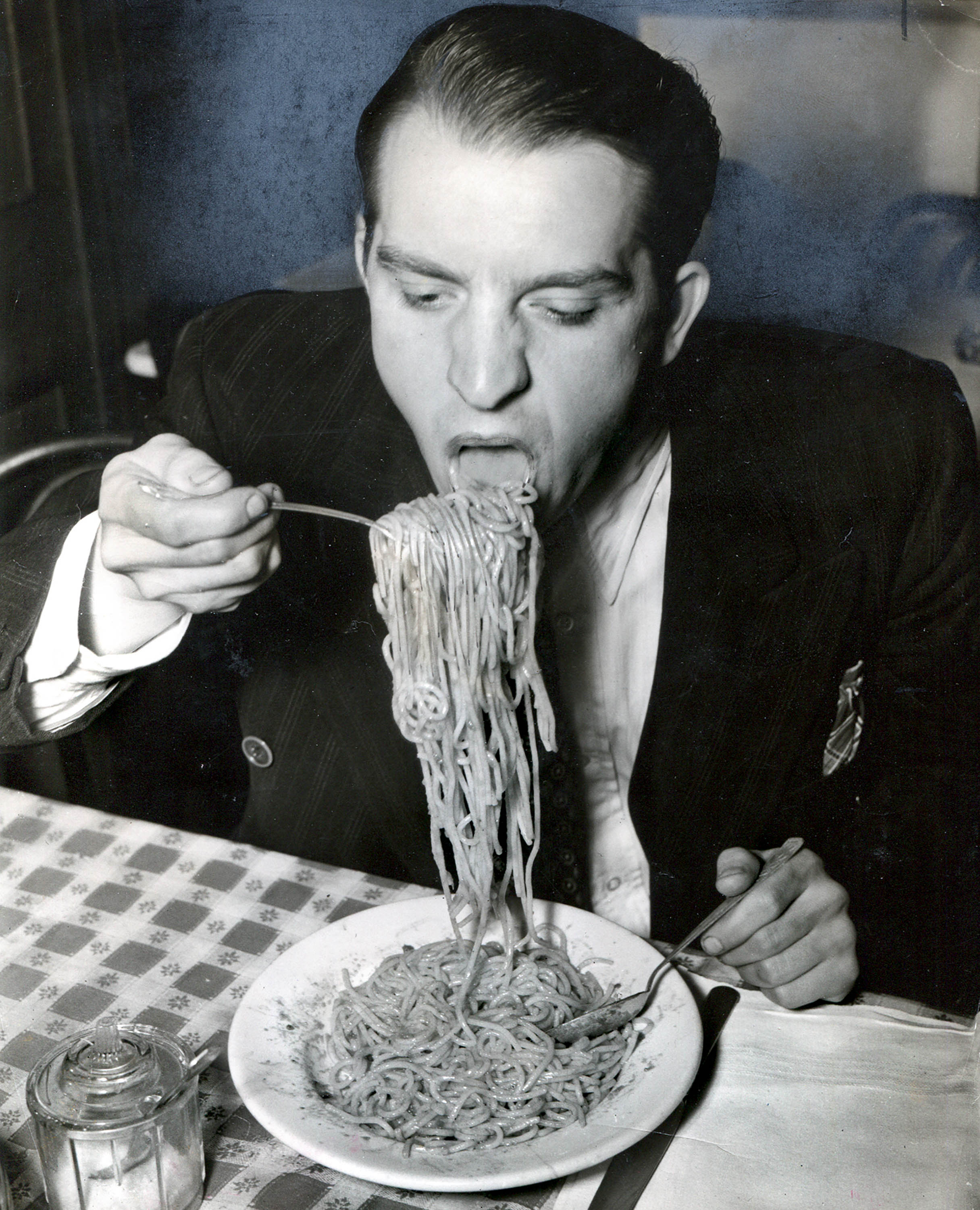 Phillip J. Stazzone is on WPA and Enjoys His Favourite Food as He's Heard That the Army Doesn't Go in Very Strong for Serving Spaghetti, 1940, Weegee / International Centre of Photography, Courtesy Ira and Suzanne Richer