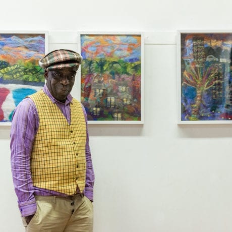 Luton born milliner, designer and artist Alva Clifford Wilson with his felt paintings as part of HIVE, a project developed in collaboration with creative producer Julia Cheng, 2018.