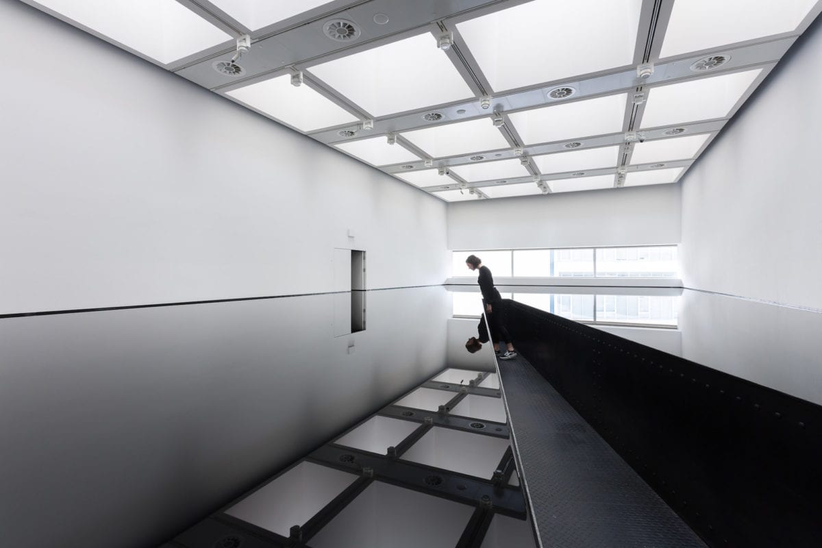 Installation view of Richard Wilson, 20:50, 1987 at Space Shifters. Courtesy of Hayward Gallery 2018. Photography by Mark Blower