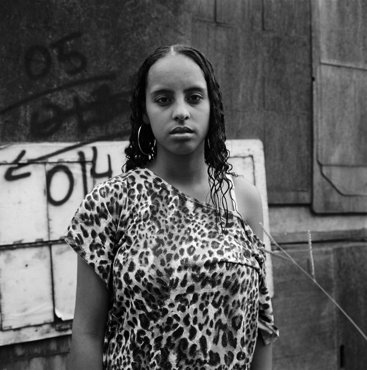 Ludovic Carème, Suelen in Front of Her House, Favela Agua Branca, São Paulo, 2009. Courtesy the artist