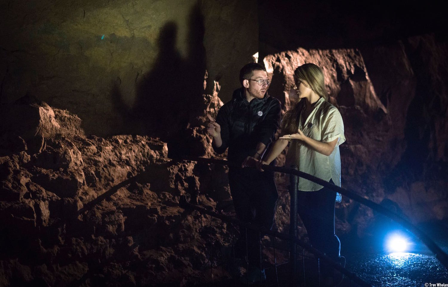 Entirely hollow aside from the dark, AlanJames Burns and Sue Rainsford discussing the work in Aillwee Caves, 2017. Photo by Trevor Whelan.