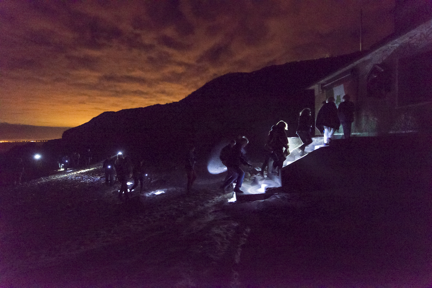 Entirely hollow aside from the dark, Audience with lights, Smugglers Cave, Portrane, Dublin, Ireland, 2016, Photo by Brian Cregan.