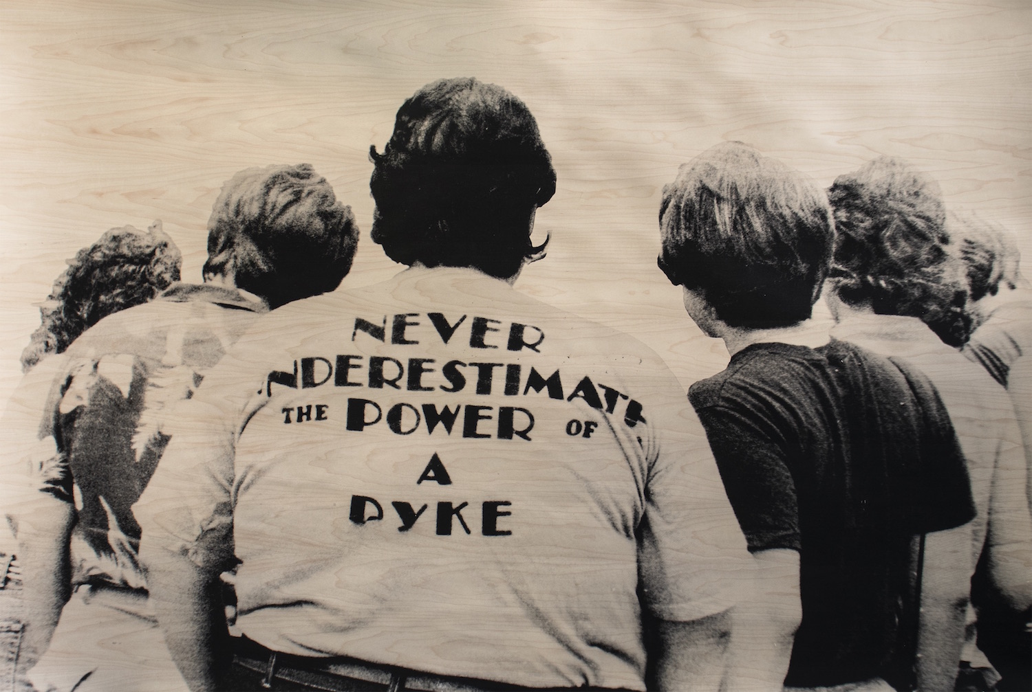 Never Underestimate the Power of a Dyke (Photographer Cindy Clark of Womenâ€™s Quarterly Journal), 2018. Maple Veneer, & Ink. Courtesy of Victori + Mo and the artist.