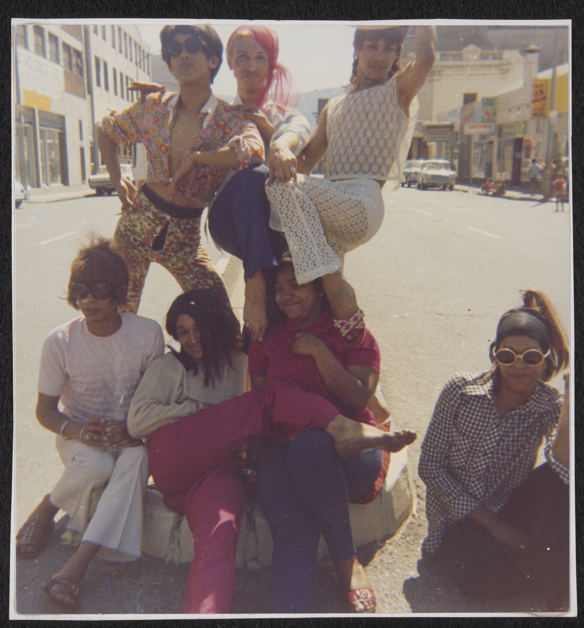 Olivia, Kewpie, Patti, Sue Thompson, Brigitte, Gaya, and Mitzy in the Middle of the Street: Group Picture on Sir Lowry Road, circa 1960 to circa 1980