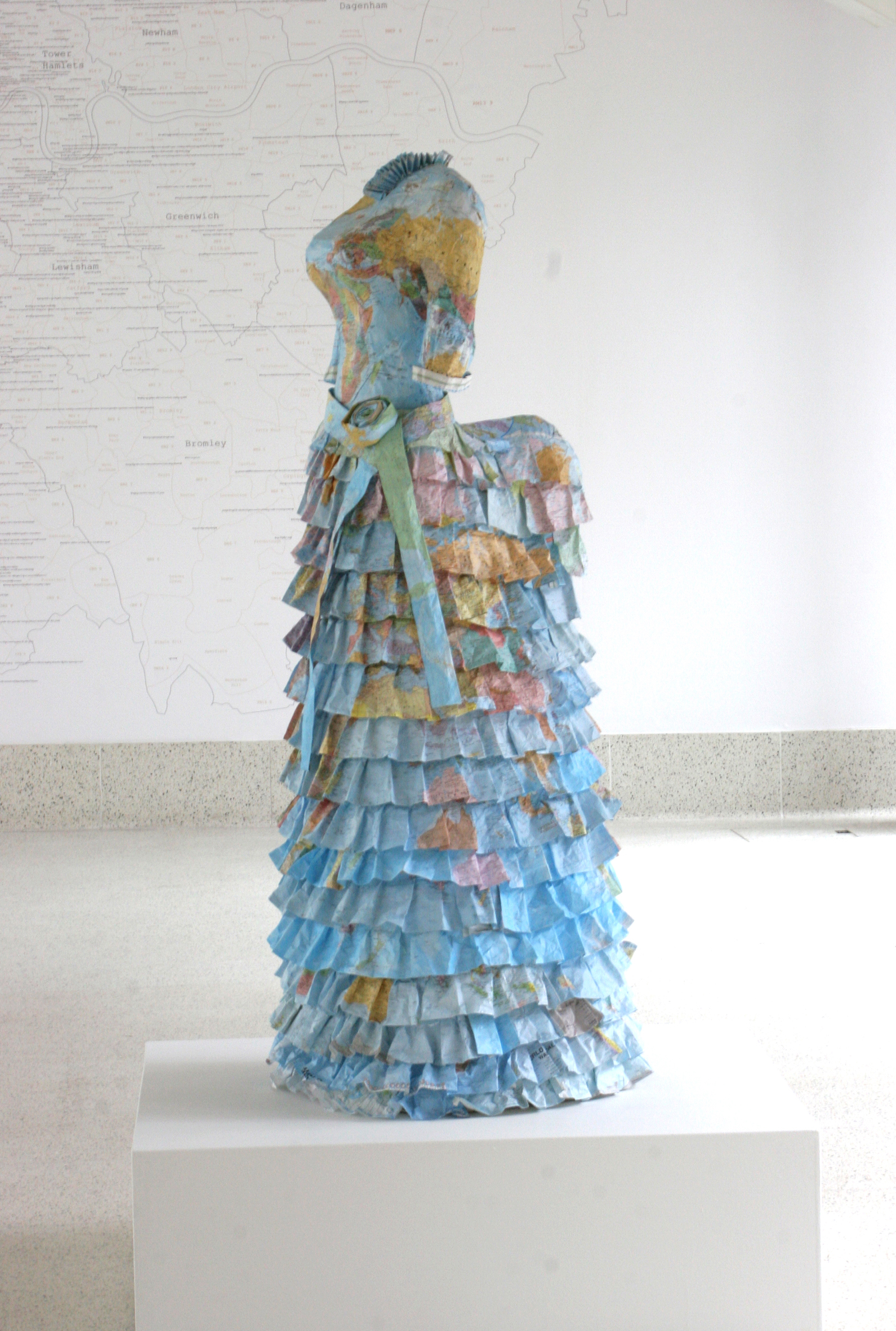 Colonial Dress made from paper maps. Lifesize Â© Susan Stockwell. Photo by Colin Hampden-White, 2011