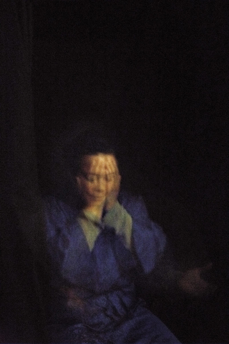 Medium Sylvia Howarth enters a trance, England, 2013.