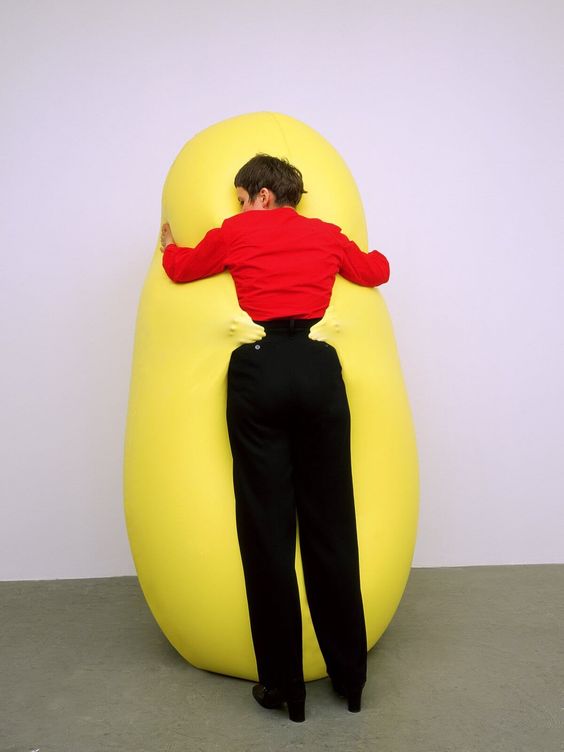 https://elephant.art/wp-content/uploads/2020/01/09.02-Hans-Hemmert-Yellow-Sculpture-Fitting-to-Mona-Standing-1998.jpg