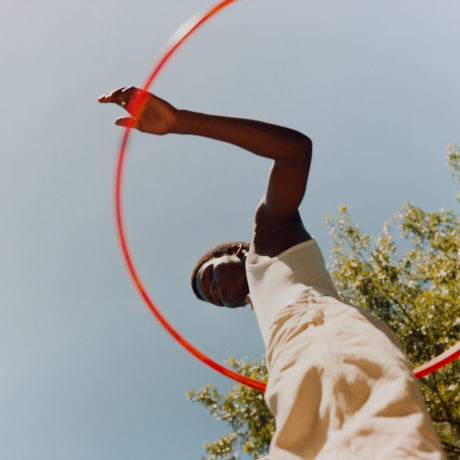 Tyler Mitchell, Untitled (Sosa with Orange Hula Hoop), 2019