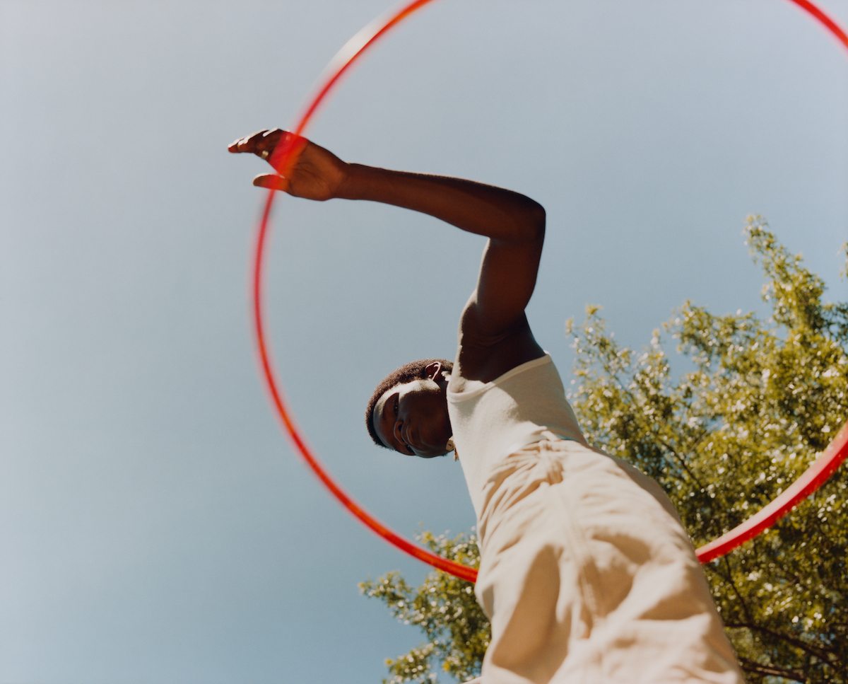 Tyler Mitchell, Untitled (Sosa with Orange Hula Hoop), 2019