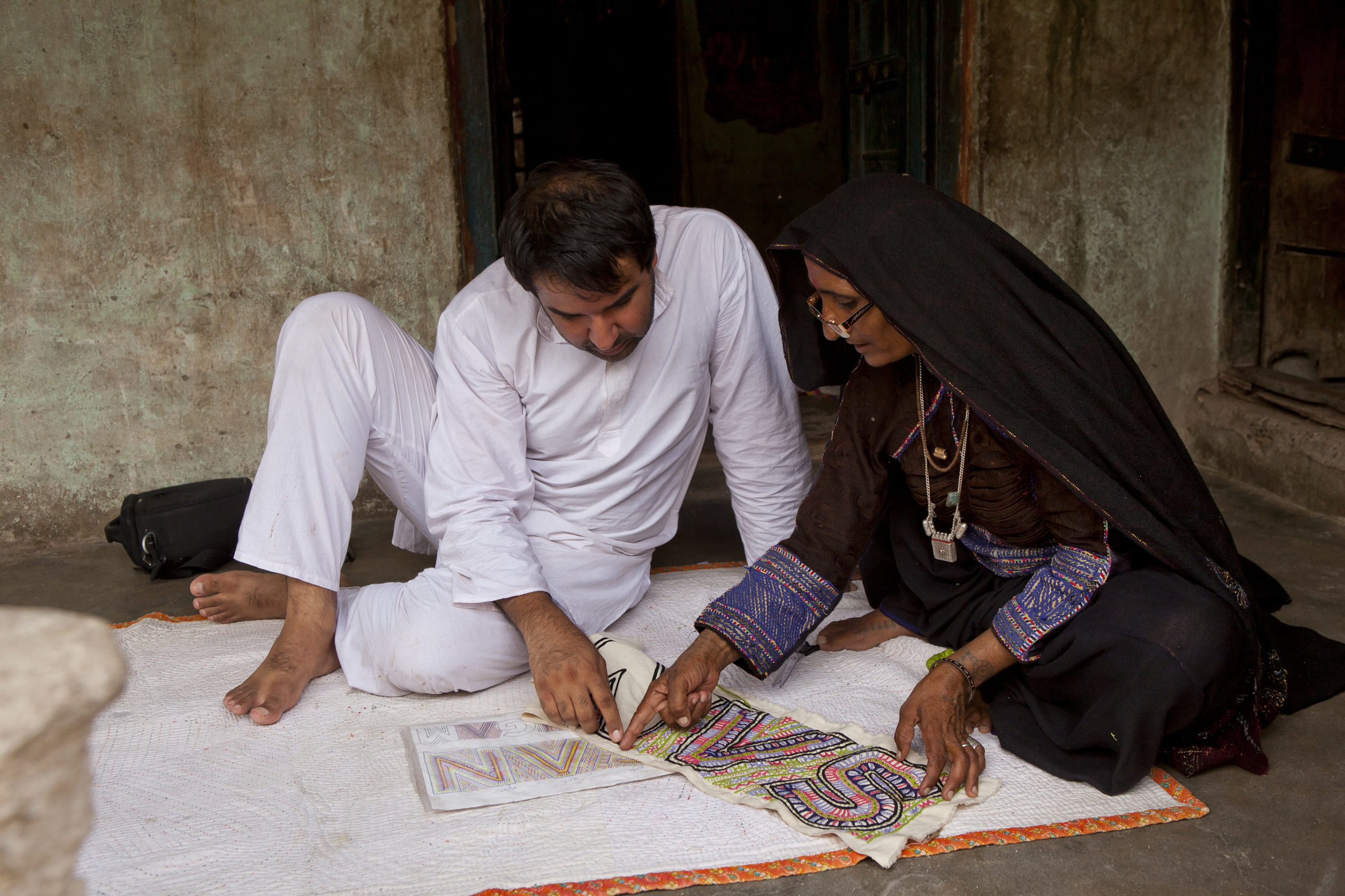 A discussion between Ishan and Sajnu ben, a craftswoman form the Dhebaria Rabari community, at her home in Kukadsar village in Kutch, Gujarat