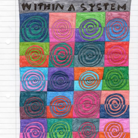 A sheet of white lined office paper, leaving the margin clear, is filled with a multicoloured pen drawing. In the middle contains a grid of twenty spirals each made up of two contrasting colours and divided horizontally in the middle. Surrounding this reads: “WITHIN A SYSTEM OF CONNECTIVITY” in black ink on a grey background.