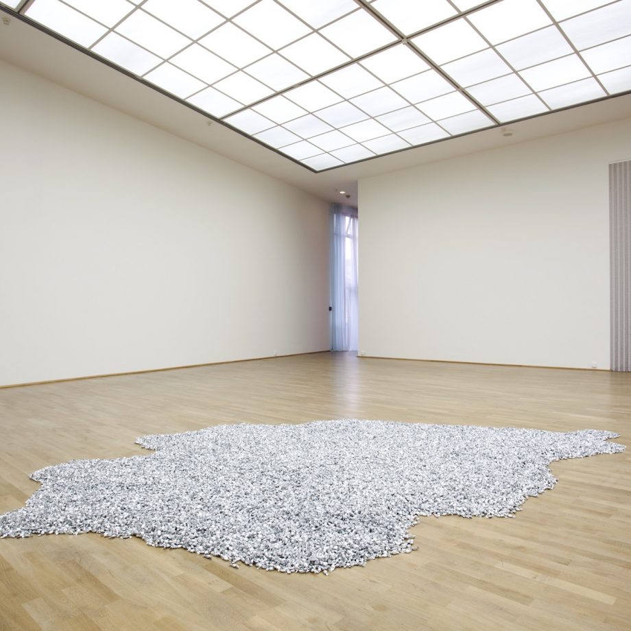 "Untitled" (Placebo), 1991. Candies in silver wrappers, endless supply. Overall dimensions vary with installation. Ideal weight: 1,000 - 1,200 lb. © Felix Gonzalez-Torres. Courtesy of the Felix Gonzalez-Torres Foundation. Installed in Felix Gonzalez-Torres: Specific Objects without Specific Form. MMK Museum für Moderne Kunst, Frankfurt, Germany. 28 Jan. – 14 Mar. 2011. Photo: Axel Schneider, Frankfurt-am-Main