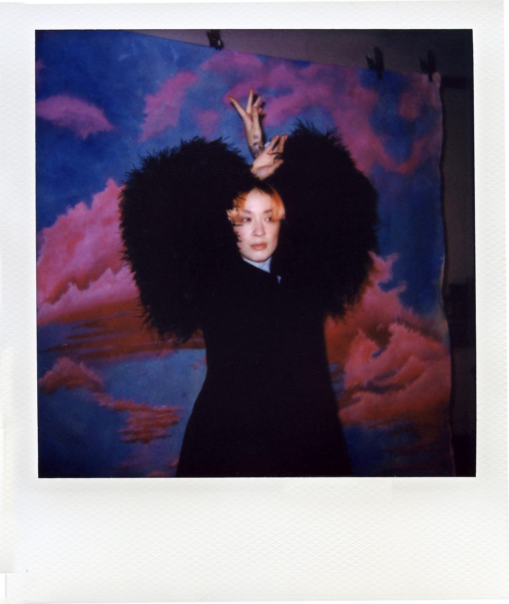 Behind-the-scenes polaroids from Sin Wai Kin and Tai Shani's Elephant shoot in early 2022