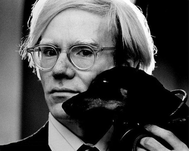 Andy Warhol with Archie, his pet Dachshund, 1973. Photo by Jack Mitchell