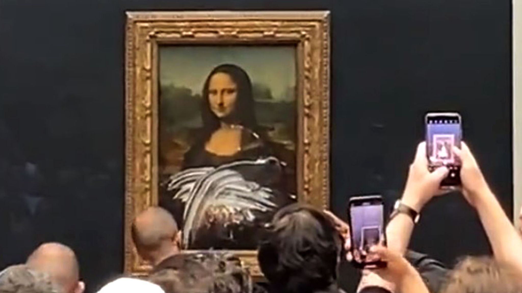 The Mona Lisa Cake Thrower Was 100% in the Right - ELEPHANT
