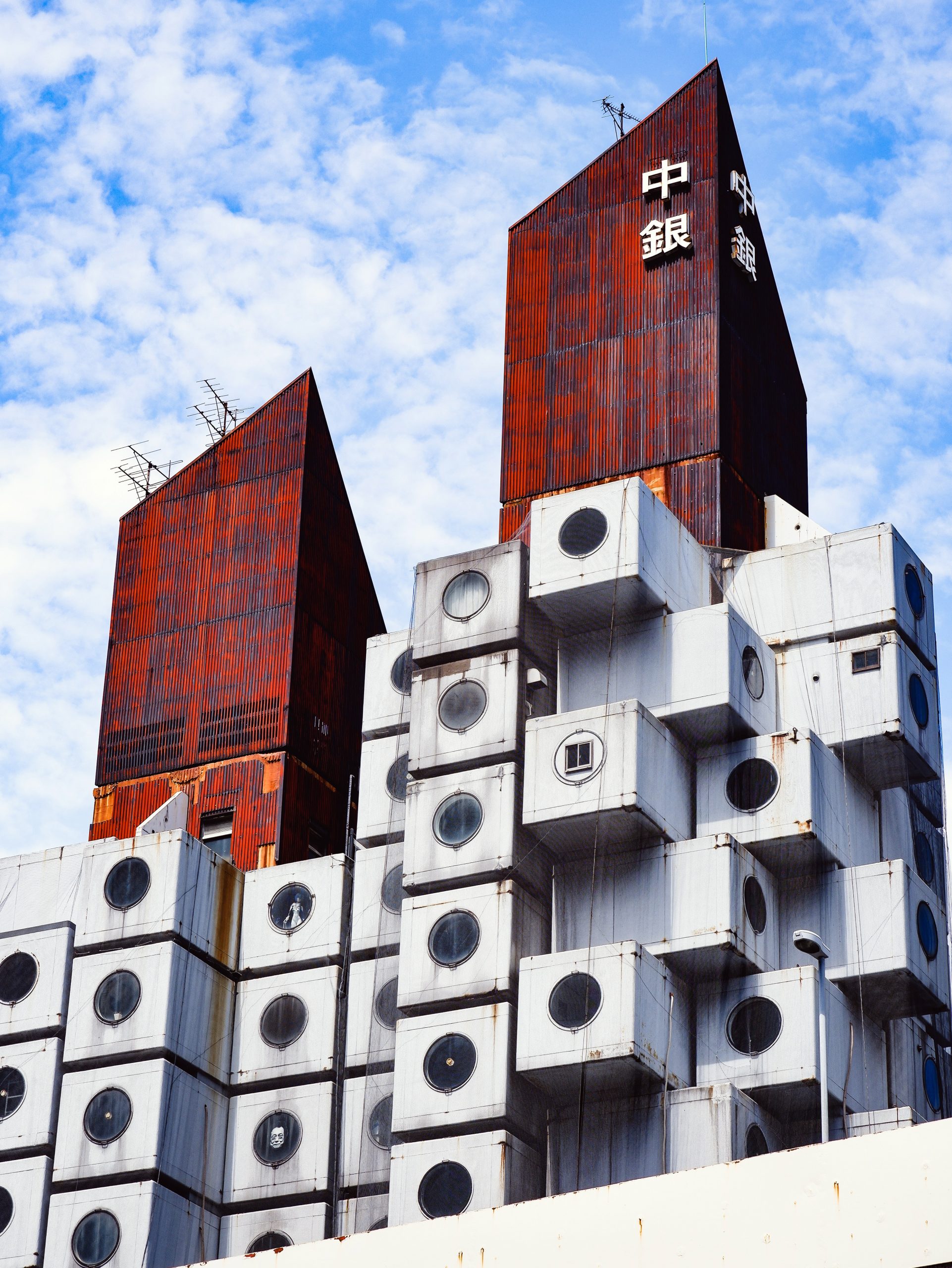 Exterior of the Nakagin Capsule Tower. Photo by Susann Schuster via Unsplash