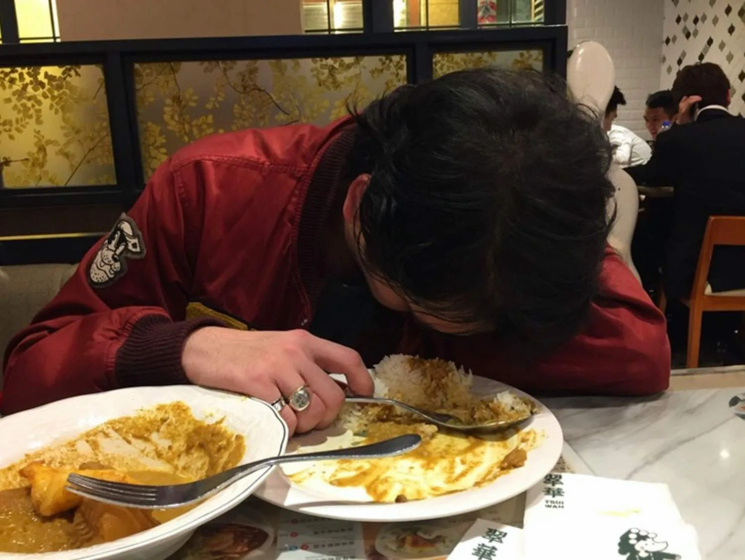 Cary passed out in curry (1)